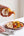 Sunnybank pineapple and habanero hot sauce poured over grilled chicken, corn and vegetables.